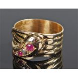 18 carat gold diamond and ruby ring, in the form of a coiled snake, ring size R