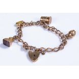 9 carat gold charm bracelet, with charms to include a tankard, bag, jug, etc, with a heart