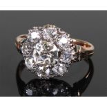 Victorian diamond flower head ring, the central diamond at approximately 1 carat surrounded by a