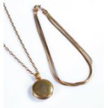 15 carat gold locket, circular form, attached to a 9 carat gold chain, together with a 9 carat