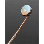 Opal set stick pin, the oval opal with yellow metal pin, cased