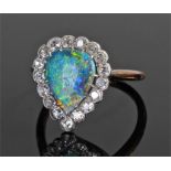 Diamond and opal ring, the pear cut opal with a round cut diamond surround, ring size S