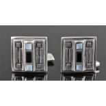 Pair of silver Secessionist style cufflinks, the cufflink ends with rock crystal and onyx set to the