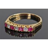 18 carat gold diamond and ruby ring, set with three diamonds and four rubies, ring size T