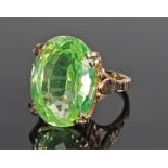 9 carat gold ring, set with a pale green facetted stone, ring size S