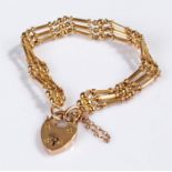 15 carat gold padlock bracelet, with a bar and ball links, padlock clasp, 17 grams