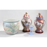 Chinese porcelain bowl, with lotus leaf and koi carp design, together with two Imari style vases and