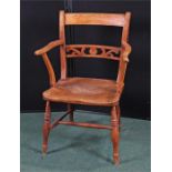 19th Century armchair, with a fret splat back above a shaped seat and turned legs