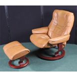 Leather armchair and conforming foot stool, in pale brown leather, (2)