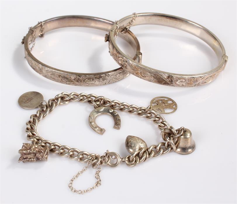 Silver jewellery, to include two bracelets and a charm bracelet