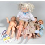 Cricket Doll with associated cassettes and instructions. Includes four vintage dolls