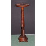 Mahogany pedestal, the dish top above a gadrooned twist column and stepped base