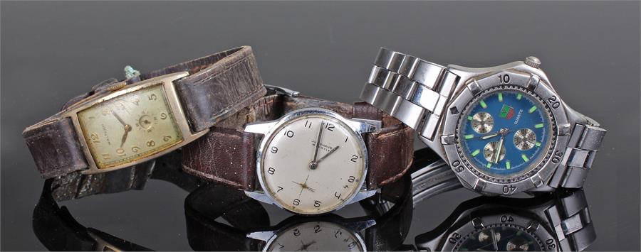 Three Gentleman's wristwatches, to include a gold plated Waltham wristwatch, a Junghans and a copy
