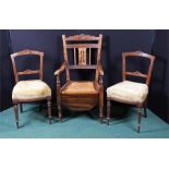 Pair of Edwardian chairs, with stuff over seats, together with a caned commode armchair, (3)