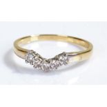 18 carat gold and diamond set ring, with arched head set with five diamonds, ring size S