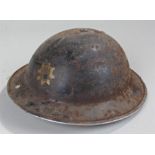 World War II Suffolk & Ipswich Fire Service helmet, with original transfer badge to the front