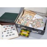 Stamp collection. WORLD. Suitcase containing envelopes & albums.