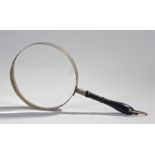 Magnifying glass of large proportions with an ebony handle. Lens diameter 20.5cm