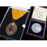 Silver and enamel Trafford Mayor medal, 1987-1988, together with a Manchester school medallion, both