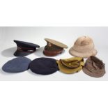 Mixed lot of head wear to include a vintage tropical helmet , together with post war British and U.