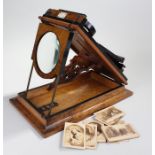 Olive wood viewer retailed by H Hughes and sons, Opticians, Fenchurch Street London. With stereo