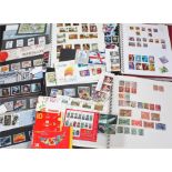 British stamp collection three albums and folder of loose ranges of M & U from Victoria to recent.