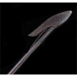 Steel spring loaded harpoon tip, wooden shaft missing, length 66.5 cm .