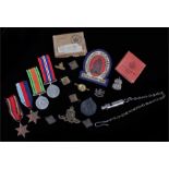 Militaria, to include a silver A.R.P. badge, A.R.P. whistle, World War II medals, Artillery