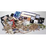 Box of costume jewellery, including a compact, necklaces, and earrings (qty)