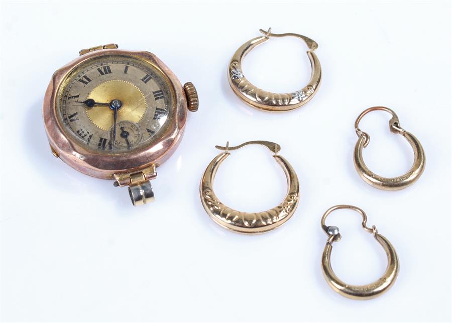 two pairs of 9 carat gold earrings, together with a 9 carat gold ladies wristwatch