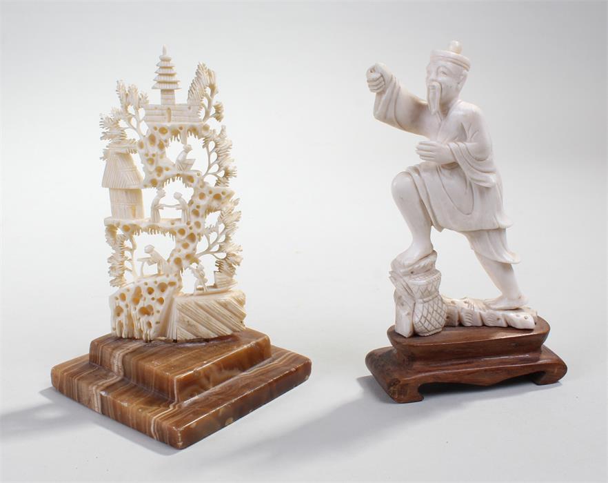 Early 20th Century Chinese ivory figure, 10.5cm high, together with an early 20th Century Chinese