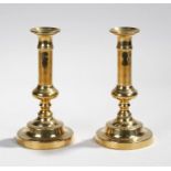 Pair of brass candlesticks with ejectors c 1830 height 20cms