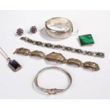 Silver jewellery, to include a silver bangle, three silver bracelets, a malachite brooch, a pair