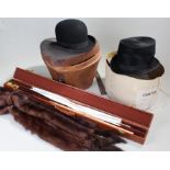 Bowler hat by Greens of Norwich including leather case, and a boxed top hat by Battersby & Co