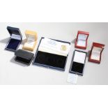 Gold proof coin set box, together with a Sovereign box and four jewellery boxes, (6)