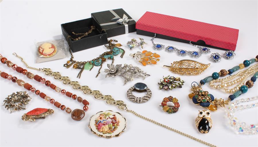 Mixed lot of costume jewellery comprising of a white metal and blue stone necklace and earring