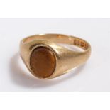 9 carat gold tigers eye signet ring, set with an oval tigers eye