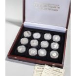 Queen Mother coin set consisting of twelve silver coins of various denominations