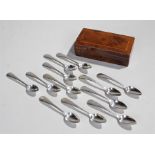 Set of twelve Dutch silver teaspoons, with pointed spoon bowls, arched handles, total weight 4.