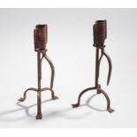 Two iron tripod leg candlesticks with sprung loaded sockets height 33.5cm