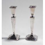 Elizabeth II pair of silver candlesticks, London 1967, maker D J S, the square tops and tapering