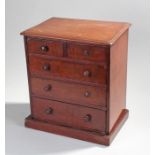 Victorian miniature chest of drawers, the rectangular top above two short and three long graduated