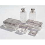 Asprey silver travelling or dressing table part set with three lidded glass boxes, two cut glass