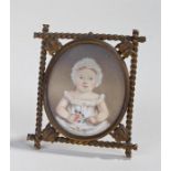 J W Rubridge miniature oval portrait of a small child wearing a white dress and bonnet and holding a