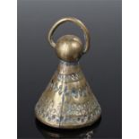Brass seal of conical shape engraved with Islamic text to the base and a repeat pattern around the