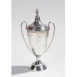 George V silver trophy, Birmingham 1932, the flame finial above a tapering body and flanked by