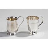 Two silver mugs, the first Birmingham 1947, of baluster form, the second Birmingham 1930, of