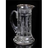 Silver and glass jug, the silver rim with London hallmark, date letter rubbed, above a cut glass and