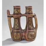 Pre Coloumbian dual flask, the pottery flask decorated with zig-zag lines, spout to the end, 25cm