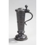 Swedish pewter flagon, Santesson, Stockholm, the lidded flagon with swirl decorated body and domed